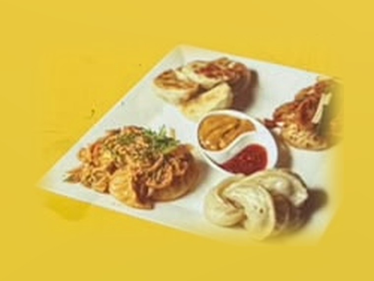 Momo platter with steamed, fried and jhol momo